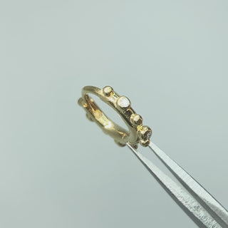 athena diamond in 14k yellow gold catching light in motion