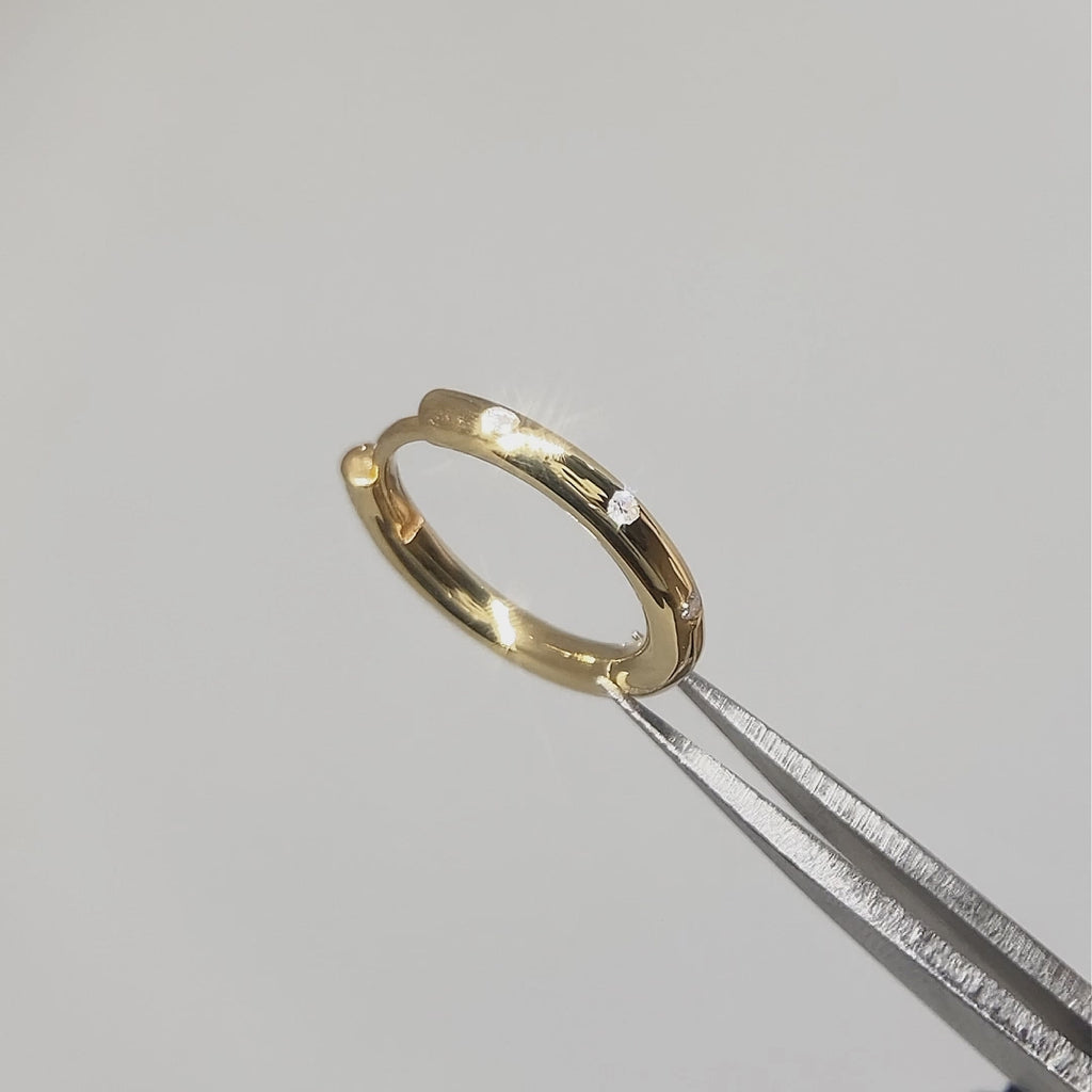 Everyday 14k gold diamond hoop earrings in motion