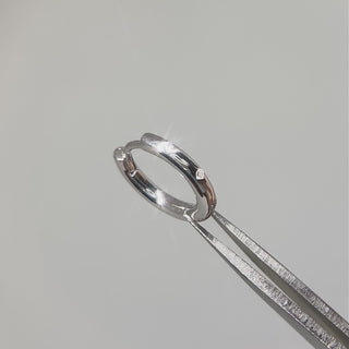 ellie hoop earrings catching light with natural movement