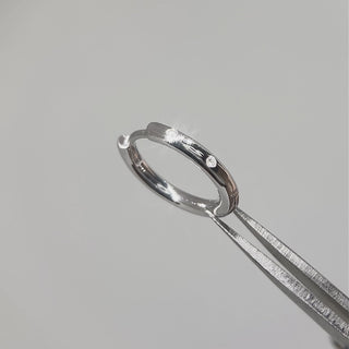 ellie hoop earrings catching light with natural movement