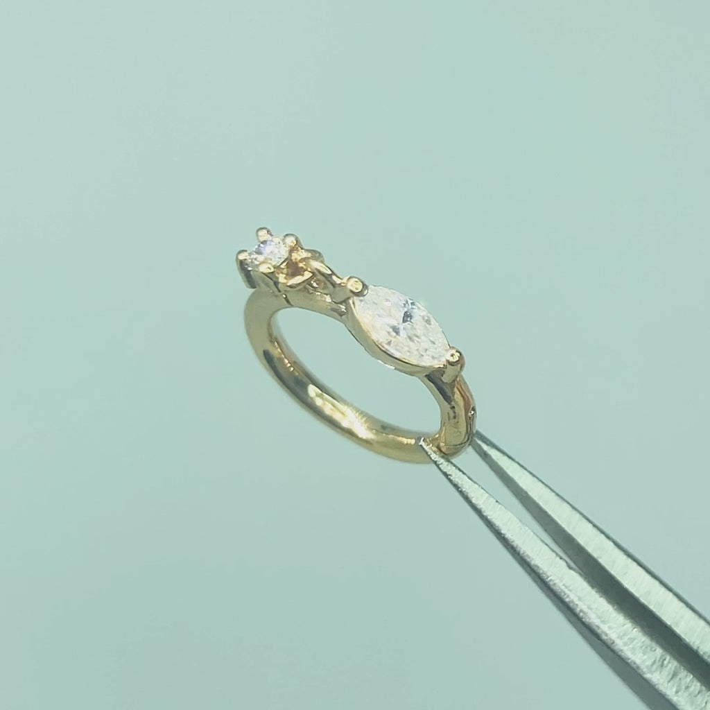 Video demonstrating the rainbow fire of the moissanite and the secure hinge mechanism