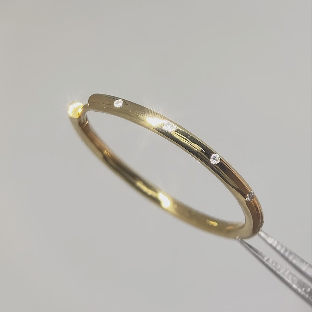 Bold gold vermeil hoop earrings with diamonds in motion