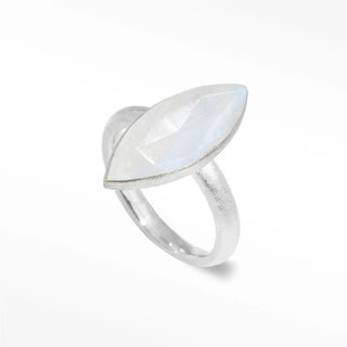 A sleek silver queen’s claw moonstone ring featuring a faceted moonstone with a pale blue iridescent glow