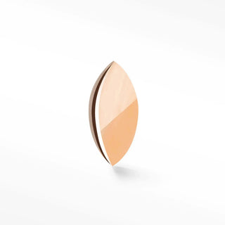A sleek almond-shaped rose gold flat back earring with a smooth gradient and thin metallic edge in 14k gold