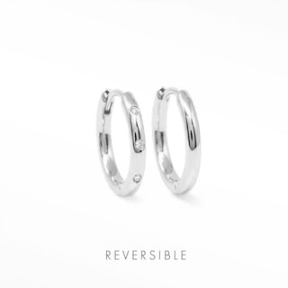 Ellie 13mm sterling silver hoops showing the diamond-set face and polished reverse