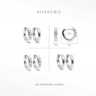 Telletubies silver hoop earrings with reversible design featuring three clear crystals and polished silver hoop surface