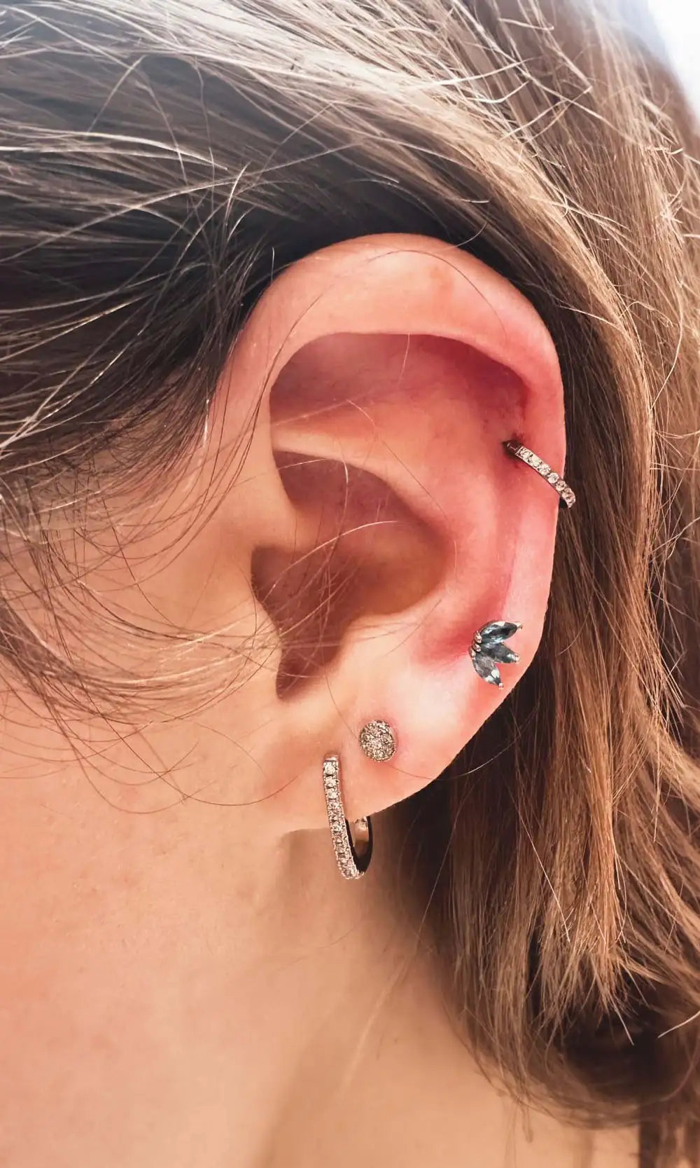 Diamond hoop piercing jewelry styled at Nina Wynn