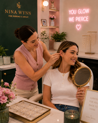 Professional piercer assessing the antihelix ridge for a snug piercing