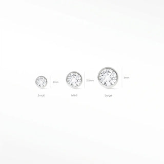 Explore the elegance of flat back earring studs in diamond bezel. Perfect for any occasion with 14k white gold.