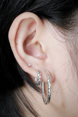  Hammered hoop earrings in 925 sterling silver worn on model for everyday styling