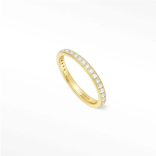 Delicate moonstone eternity band Thea with a 14k gold band featuring a continuous line of sparkling diamonds