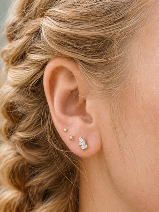 Threadless flat back earrings crafted in solid 14k yellow gold. Easy insertion with a secure low-profile fit