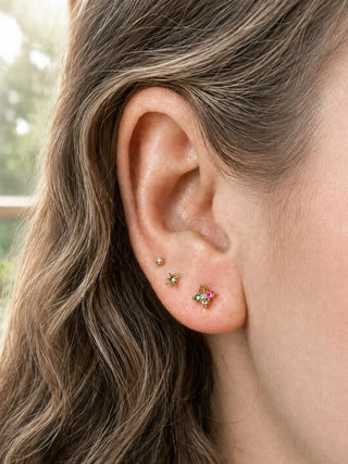 Explore our flat back earrings featuring multi tourmaline stones set in 14k yellow gold. Perfect for every occasion!