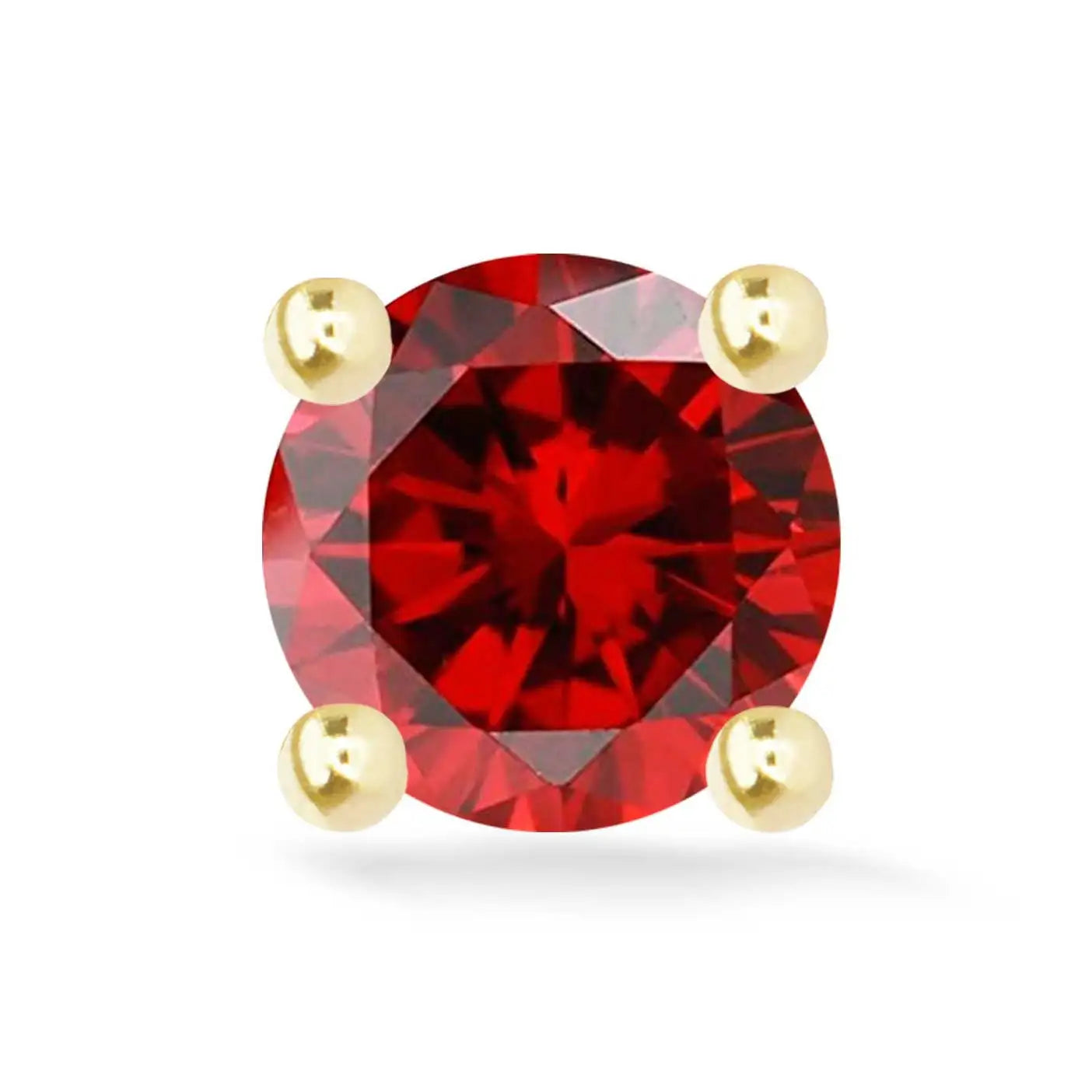 A vibrant red gemstone, likely a ruby, set in four-pronged gold mounting.