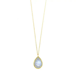 A delicate vintage lace moonstone vermeil necklace with a teardrop light blue moonstone and diamond bezel setting