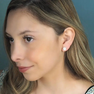 Vintage lace round 7mm moonstone silver stud earrings featuring delicate round white studs with subtle sparkle