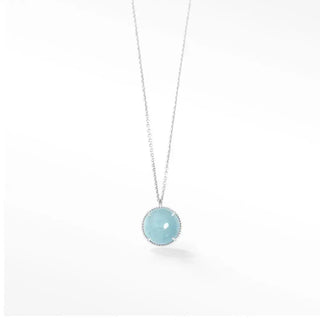 A vintage lace round aquamarine silver necklace features a light blue jade pendant with subtle sparkle details