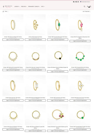 Yellow 14k gold clicker 195 rings with various gemstone designs including diamonds, emeralds, sapphires, and black diamond accents.